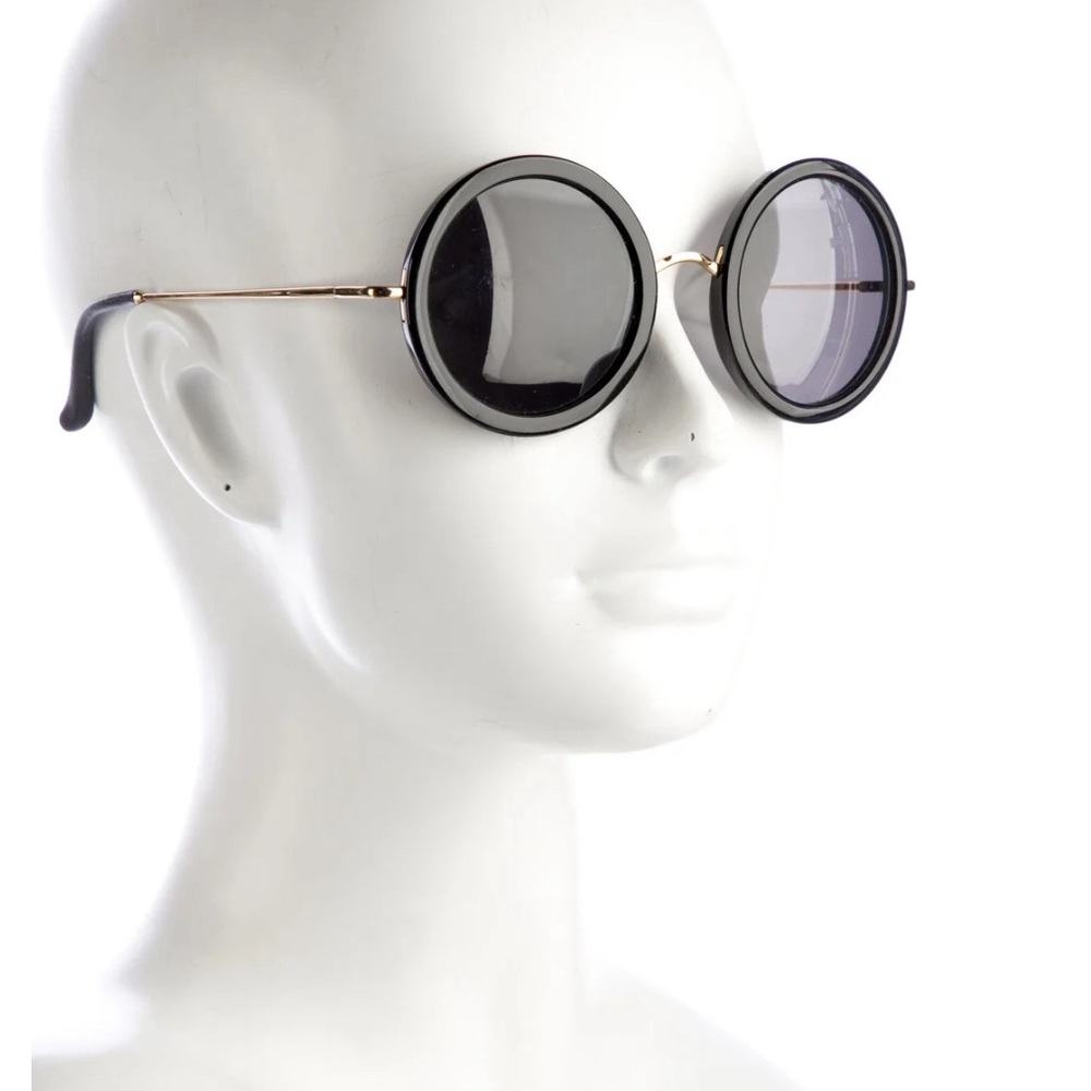 The Row round black spring hinge  sunglasses. Like new. Never been worn.